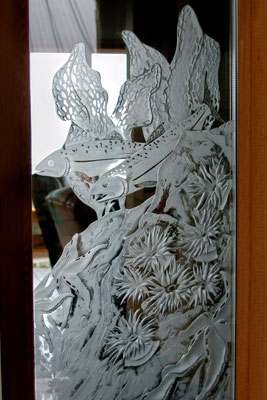 Deep carved etched window